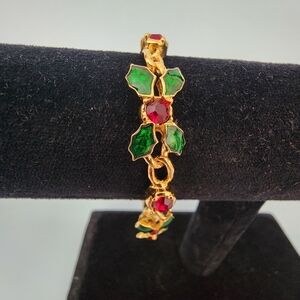 Elegant Gold and Green Bracelet with Red Accents